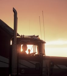 a-silhouette-of-a-truck-driver-on-his-cb-radio-in-2025-04-03-05-35-26-utc-min